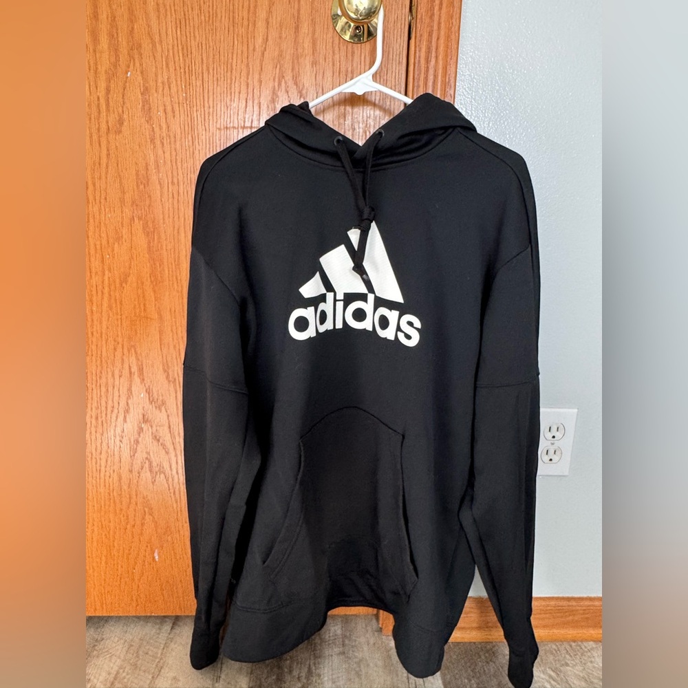 Adidas Climawarm size large black hoodie transfer logo, small snag on back